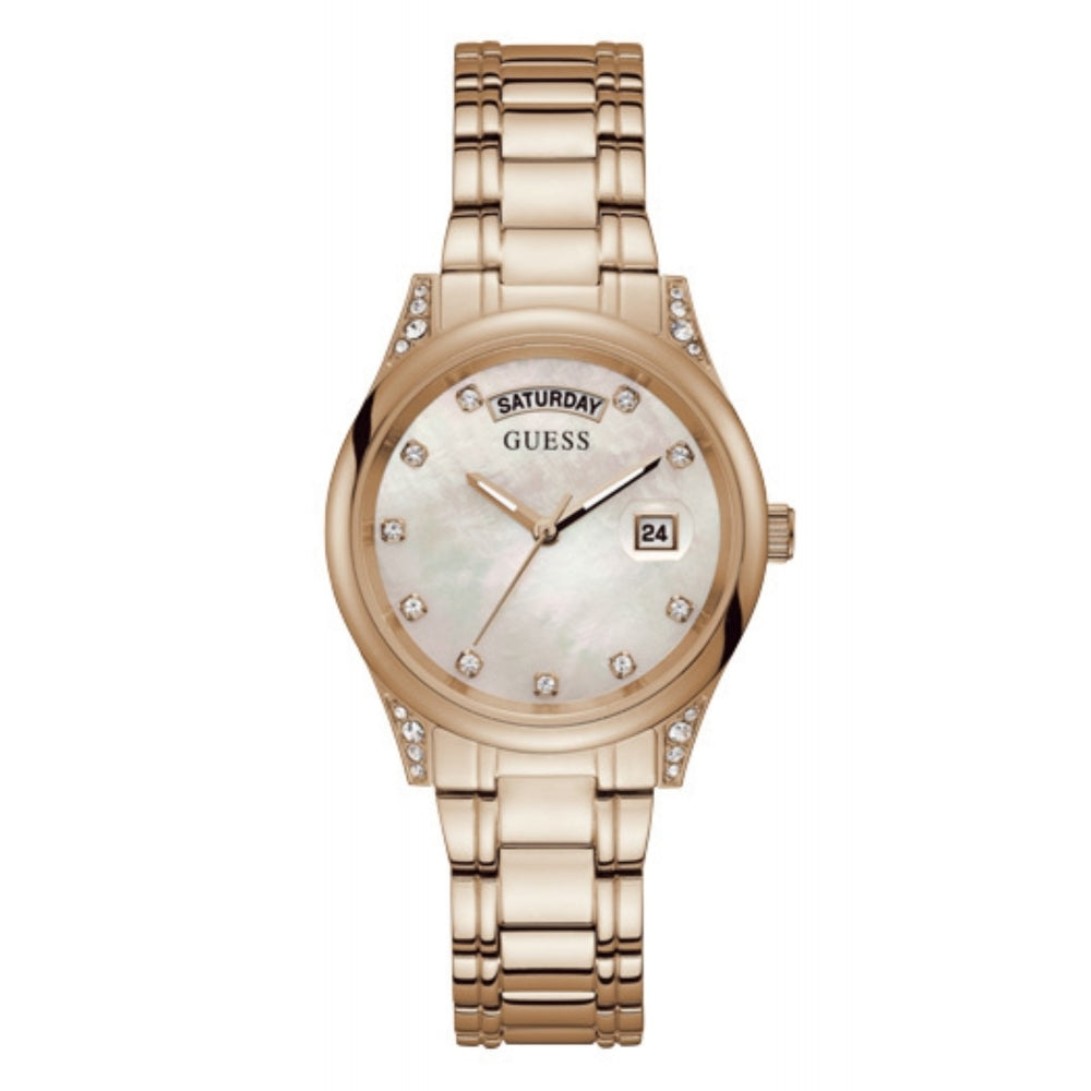 The Guess GW0047L2 Ladies Aura Watch features a rose gold-tone round face, day and date displays, crystal hour markers, and a stylish metal link band.