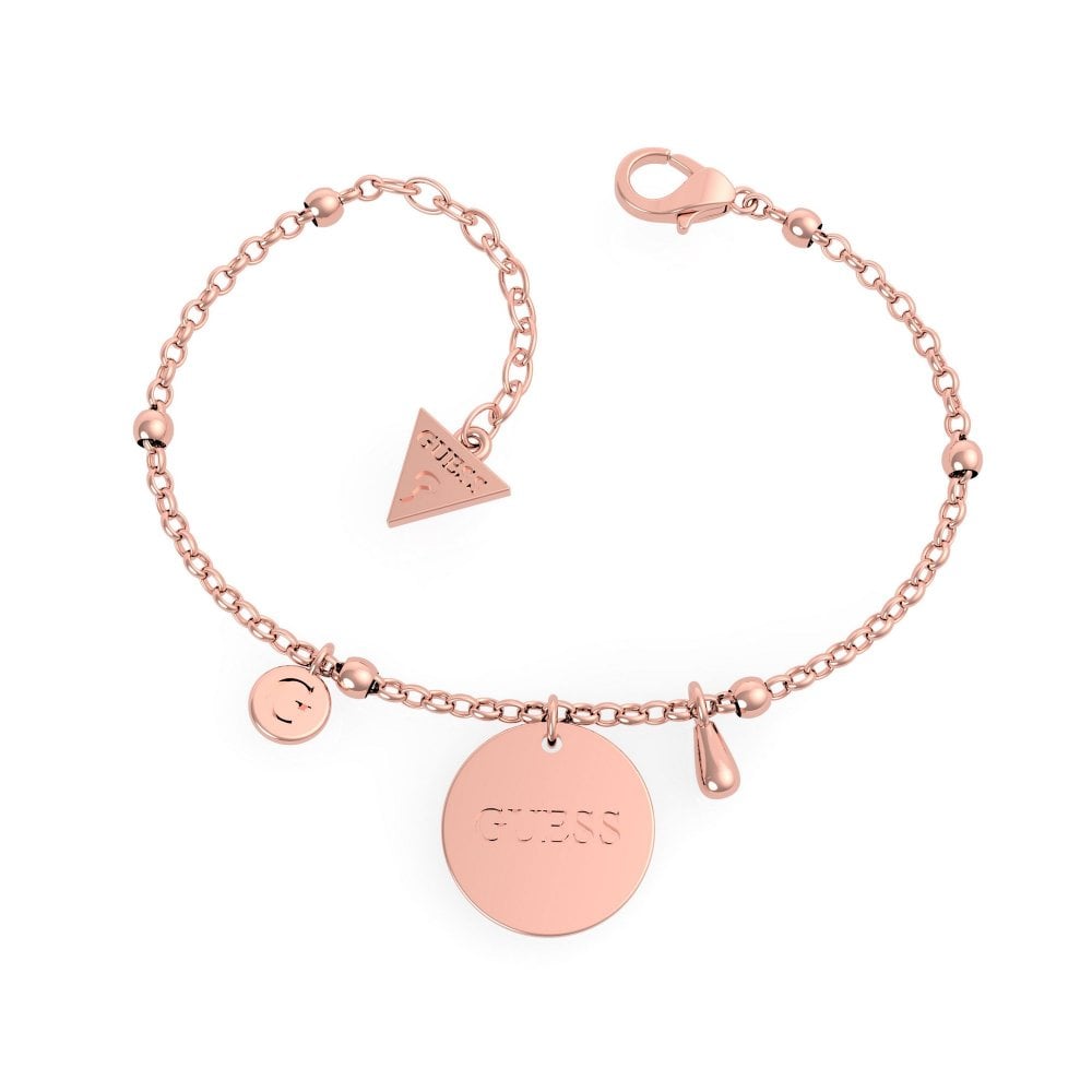 The GUESS Rose Gold Peony Charm Bracelet UBB29119-L features a lobster clasp, Guess logo on a round disc charm, plus a small round disc and teardrop-shaped charm.