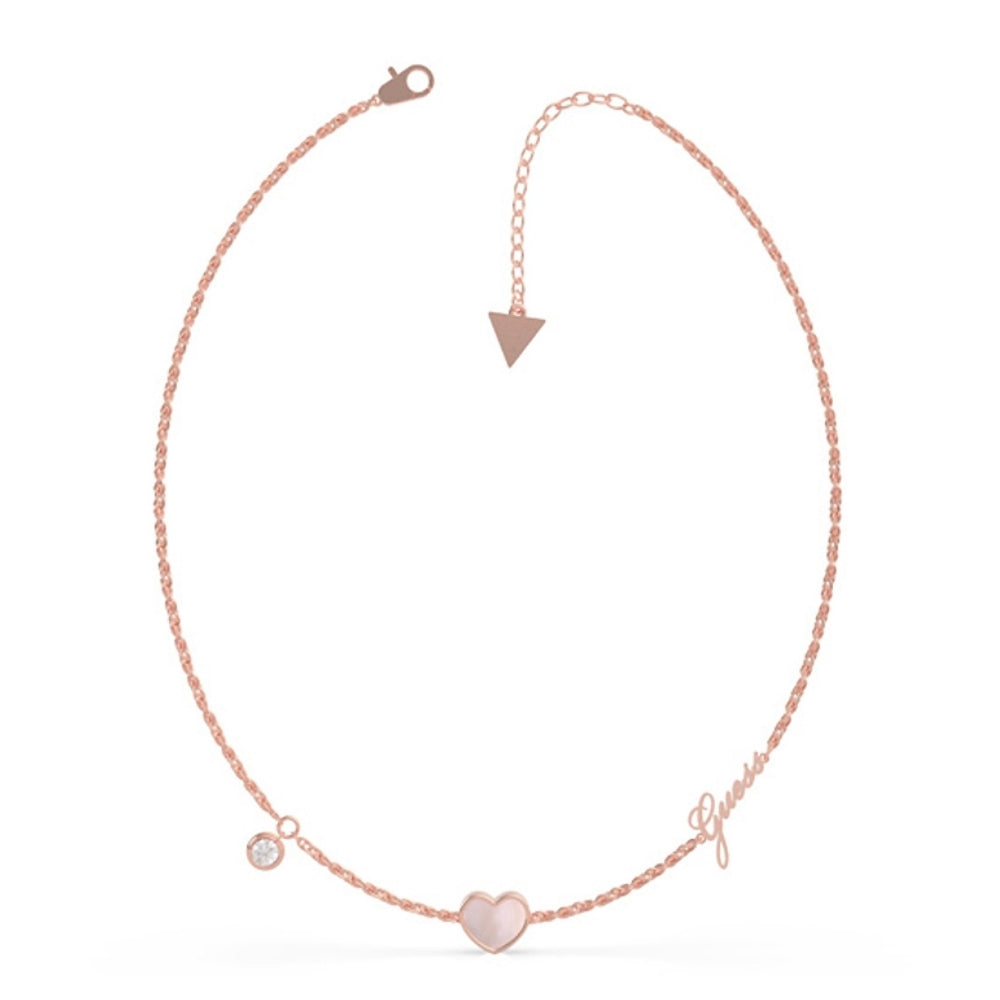 The Guess UBN79017 Sea Gift Rose Gold Tone Heart Necklace features a small heart pendant, round crystal charm, Guess logo, adjustable chain, and signature triangle detail—an elegant choice for any occasion.