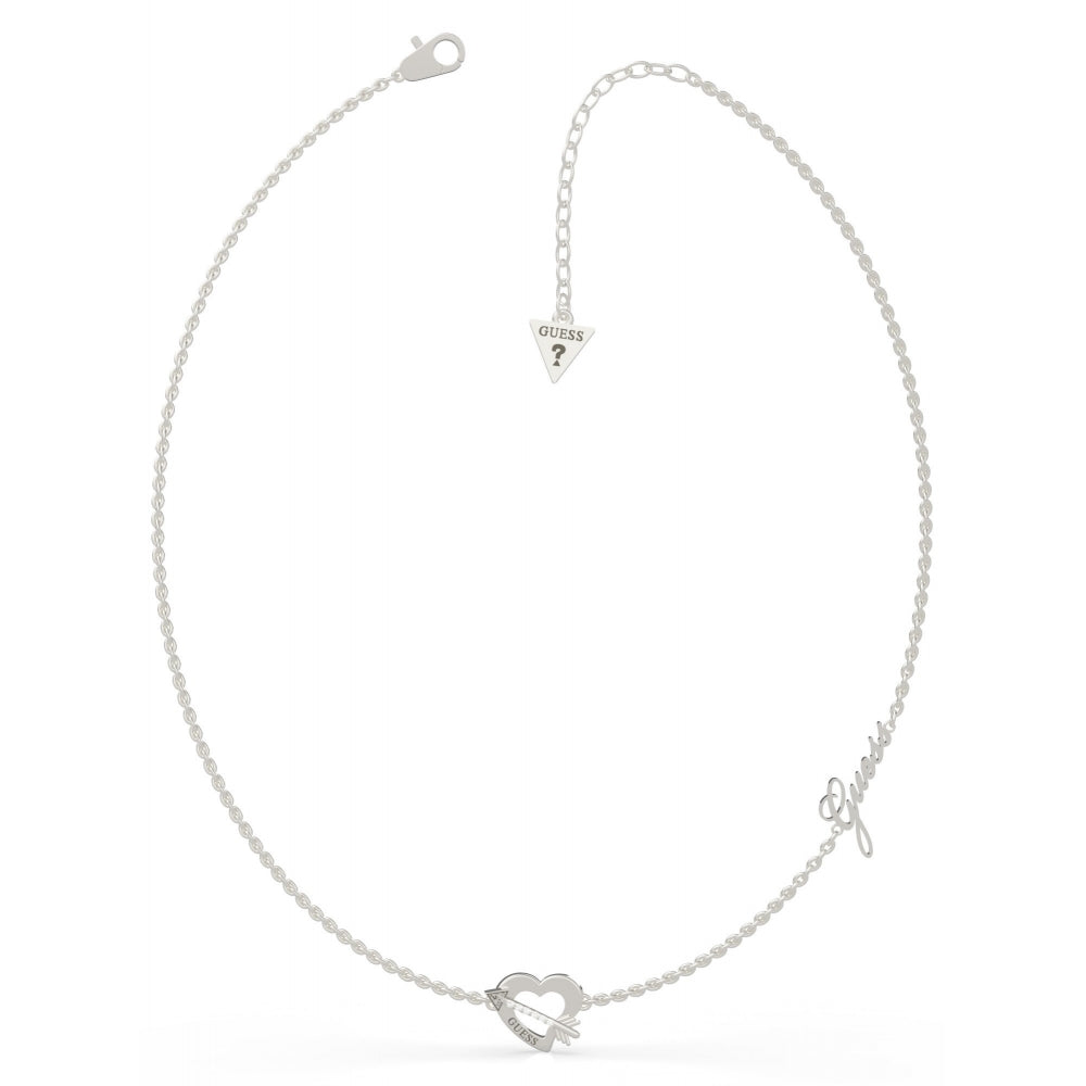 The Guess Across My Heart Necklace UBN79059 features a rhodium-plated silver chain, heart-shaped pendant with Swarovski crystals, a "Guess" logo charm, and a secure lobster clasp closure.