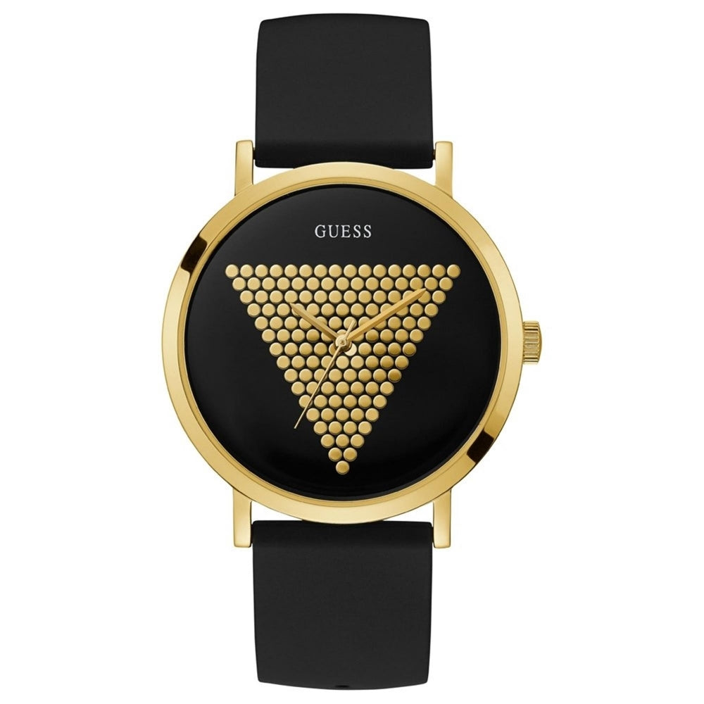 The Guess W1161G1 Gent's Gold Tone Trend Black Dial Watch features a gold polka dot triangle on its black face, a black silicone strap, and the Guess logo at the top.