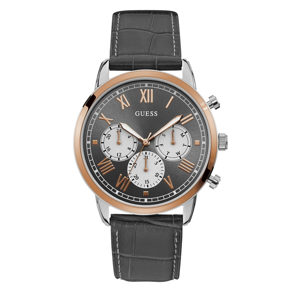 The Guess W1261G5 Men's Hendrix watch features a stainless steel case, black crocodile-style leather strap, round black dial with rose gold and silver accents, and three subdials.