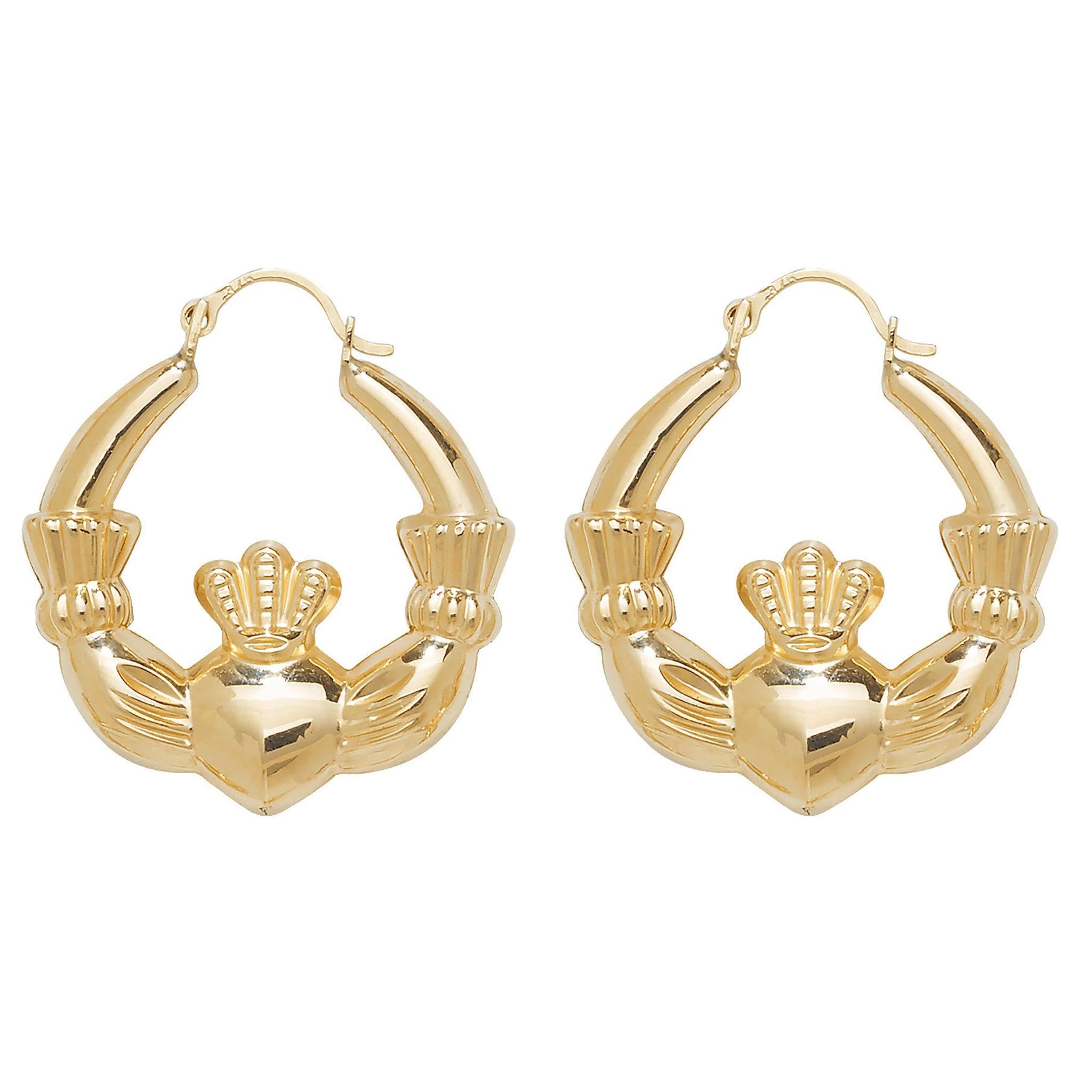 The 9ct Gold Irish Claddagh Creole Earrings feature the classic crowned heart held by two hands, crafted in yellow gold and inspired by the traditional Claddagh design.