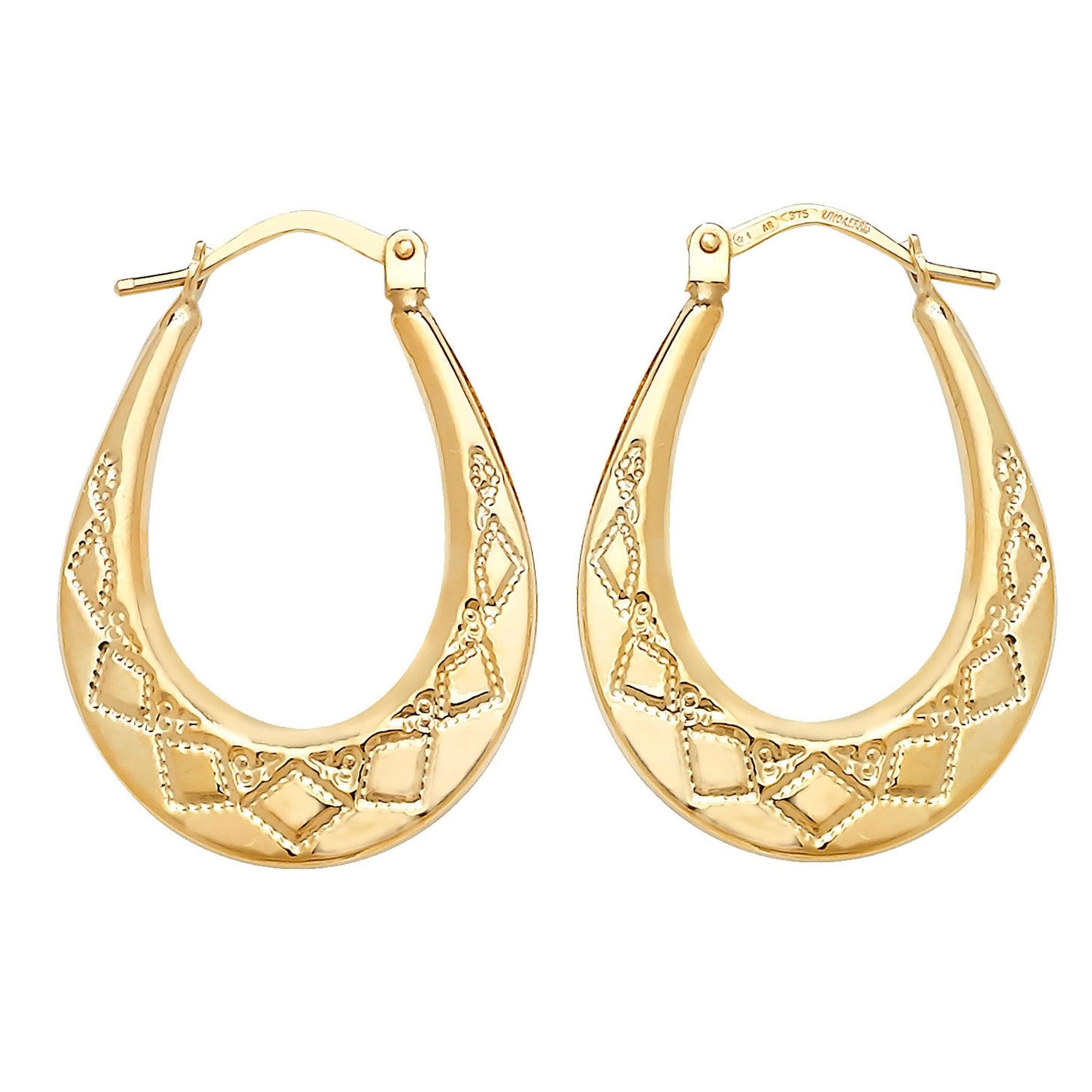 A pair of 9ct gold oval harlequin creole earrings with diamond-pattern engravings, displayed against a white background.