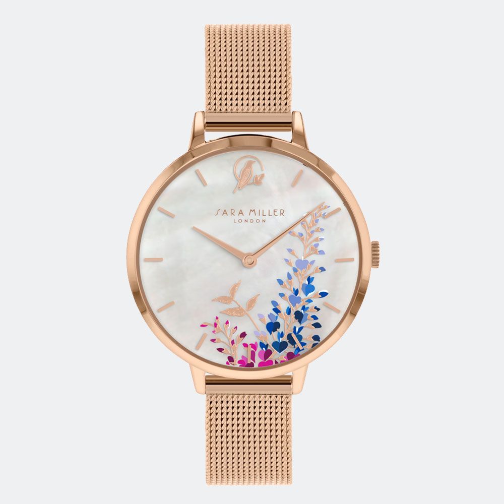 The Sara Miller Wisteria Rose Gold Tone Mesh SA4032 watch features a mesh strap and showcases a floral and bird motif on a stunning mother of pearl dial.