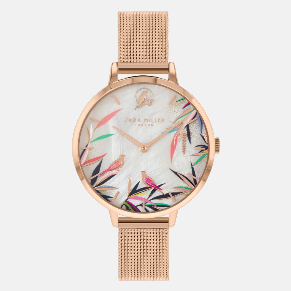 The SARA Miller Pearl Bamboo Gold Mesh Watch SA4070 features a gold case, a rose gold mesh strap, a dial adorned with colorful birds and leaves, and the "Sara Miller London" logo displayed on the face.