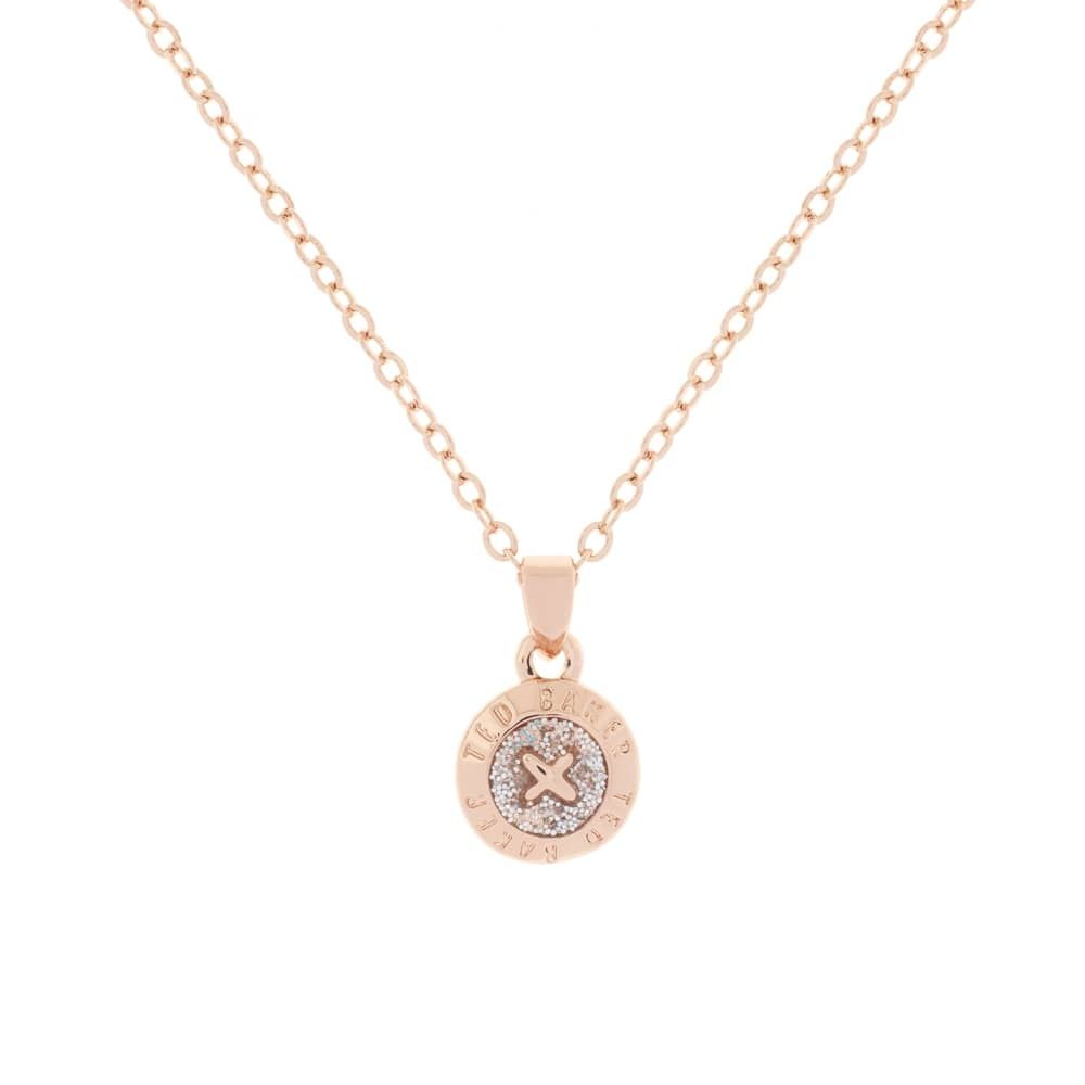 The Ted Baker Elvina Rose Gold Finish Pink Enamel Mini Button Pendant Necklace TBJ1260-24-138 features a mini button design with an 'X' crystal detail and engraved text around the edge.