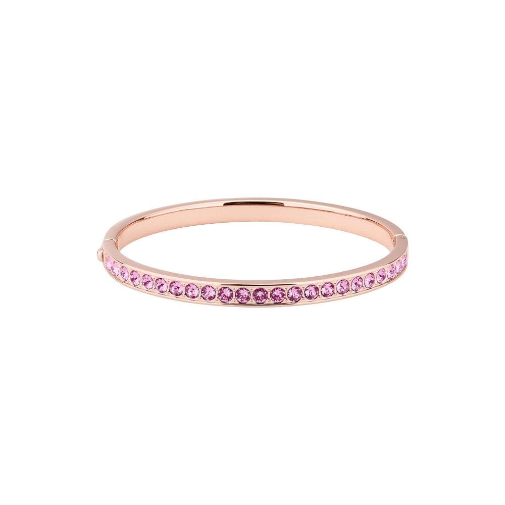 The Ted Baker Clemara Rose Gold Tone Hinge Crystal Bangle TBJ1567-24-04 features a slim rose gold bangle with a single row of sparkling crystals set along the top half.