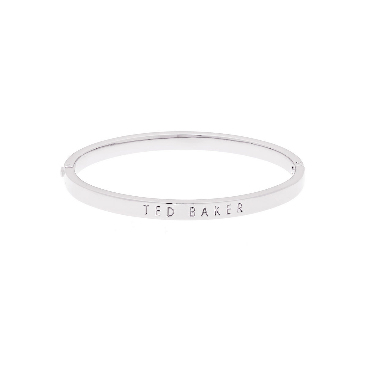 The Ted Baker Silver Plated Clemina Hinge Metallic Bangle TBJ1568-01-03 features the "TED BAKER" engraving on the front and a chic Clemina hinge for easy wear.