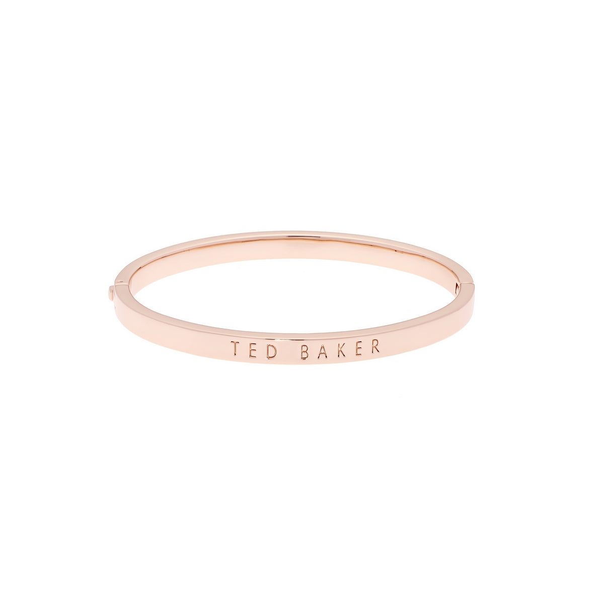 The Ted Baker Clemina Rose Gold Tone Hinged Bangle TBJ1568-24-03 is a sleek bracelet with "TED BAKER" elegantly engraved on the front.