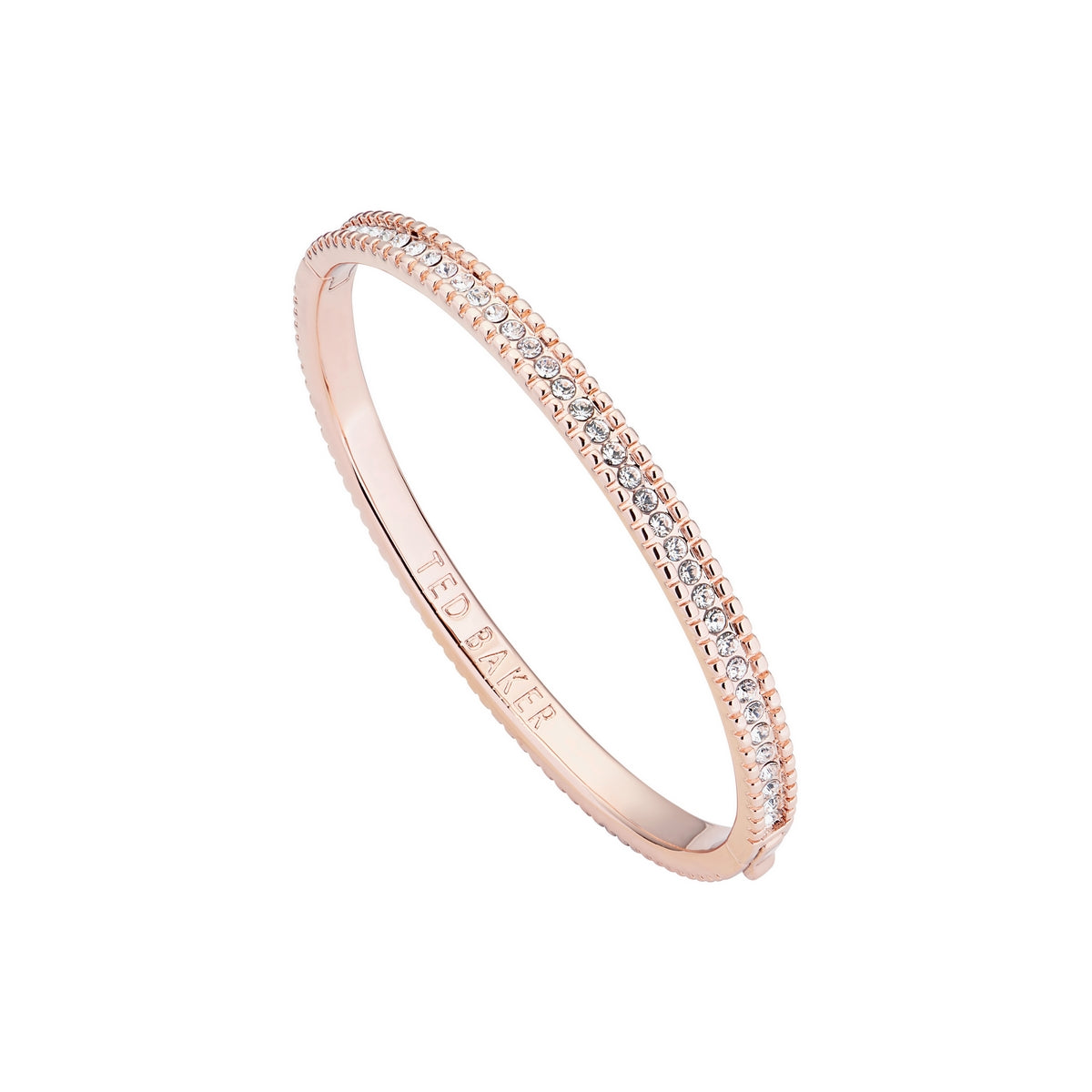 The Ted Baker Cleomor Halo Crystal Bangle TBJ2042-24-02 features a rose gold, textured beaded design with "TED BAKER" engraving, adding a touch of elegance to any outfit.