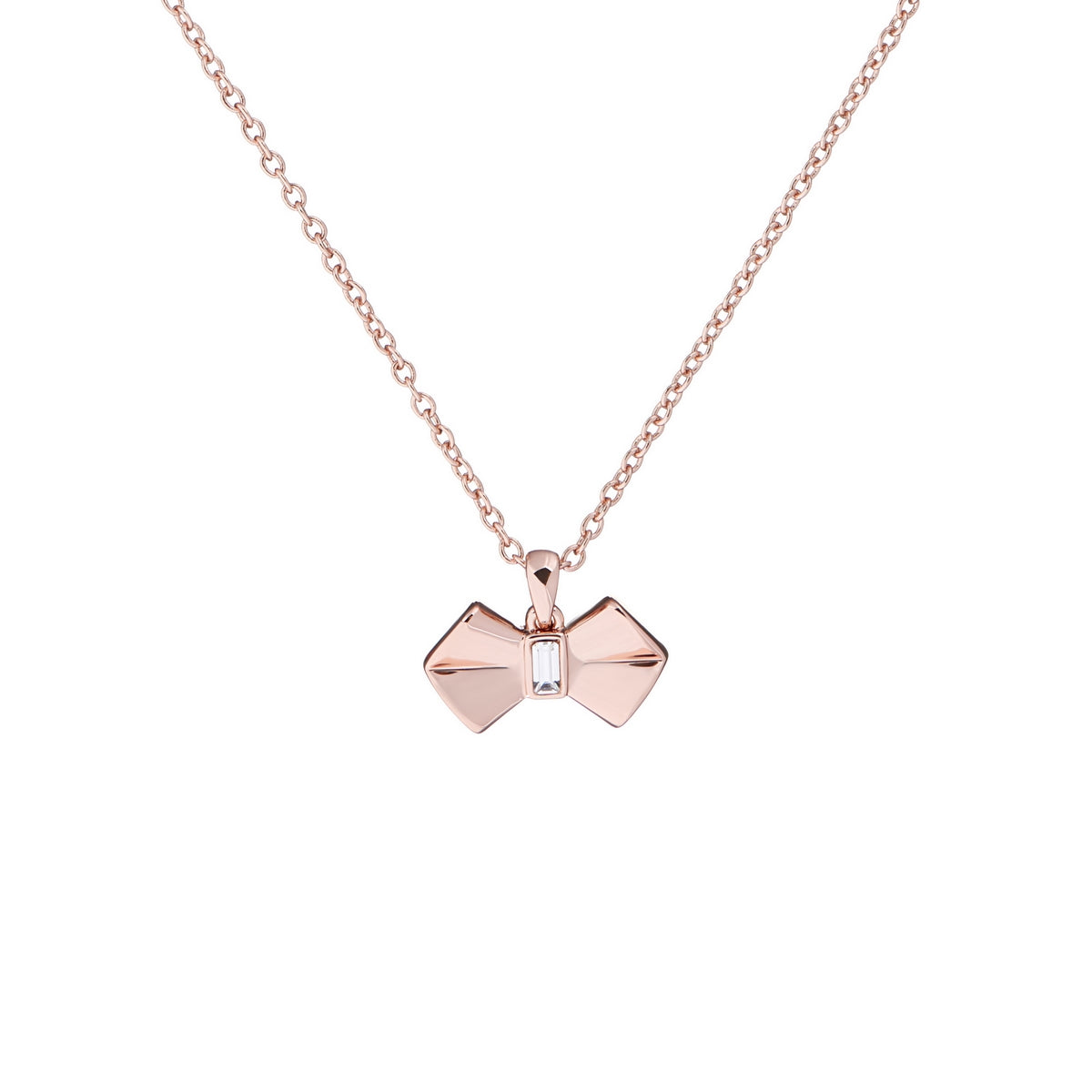 The TED BAKER Rose Gold Finish Sarrah Solitaire Swarovski Crystal Tux Bow Pendant Necklace (TBJ2164-24-02) features a bow-shaped pendant with a sparkling Swarovski crystal centerpiece.