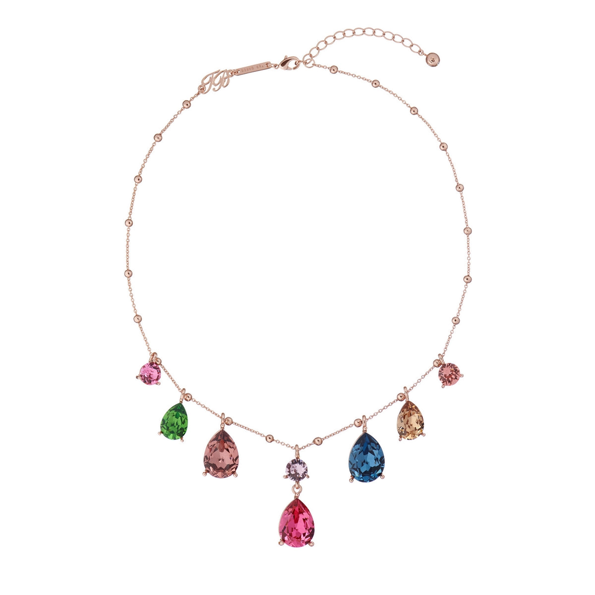 The TED BAKER Candii Swarovski Crystal Candy Statement Rose Gold Finish Necklace TBj2466-24-01 features a rose gold chain, six colorful gemstone pendants, and a purple cross-shaped Swarovski Crystal at the center.