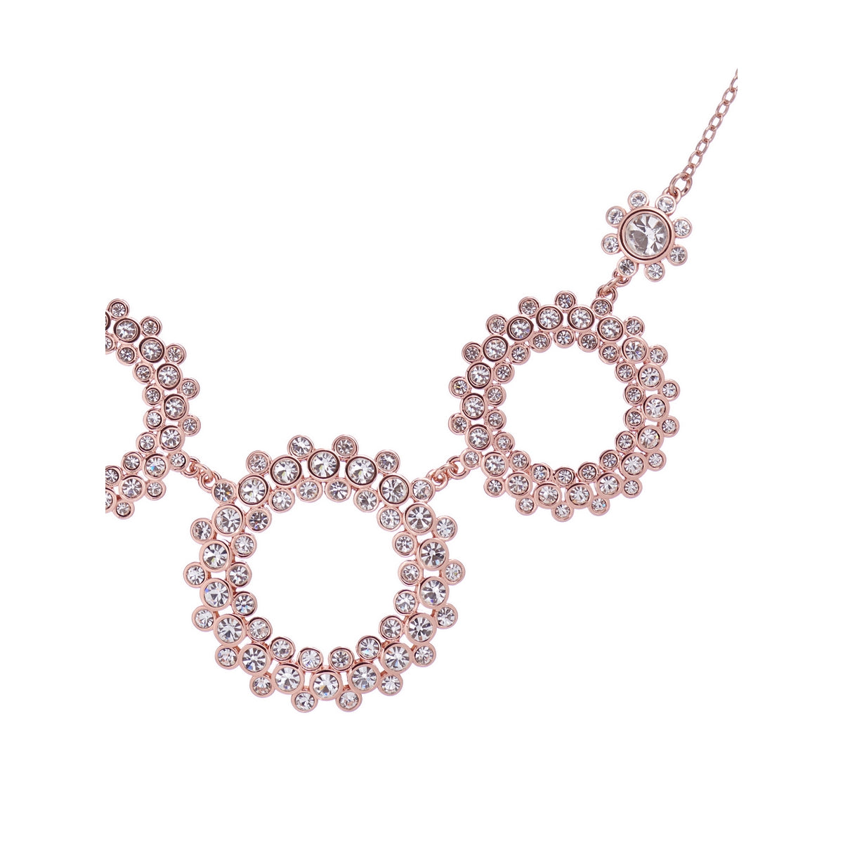 The Ted Baker Swarovski crystal Aurora Rose Gold Tone Necklace (TBJ2692-24-02) features three circular pendants with clear crystals on a delicate chain—a timeless rose gold necklace perfect for any occasion.