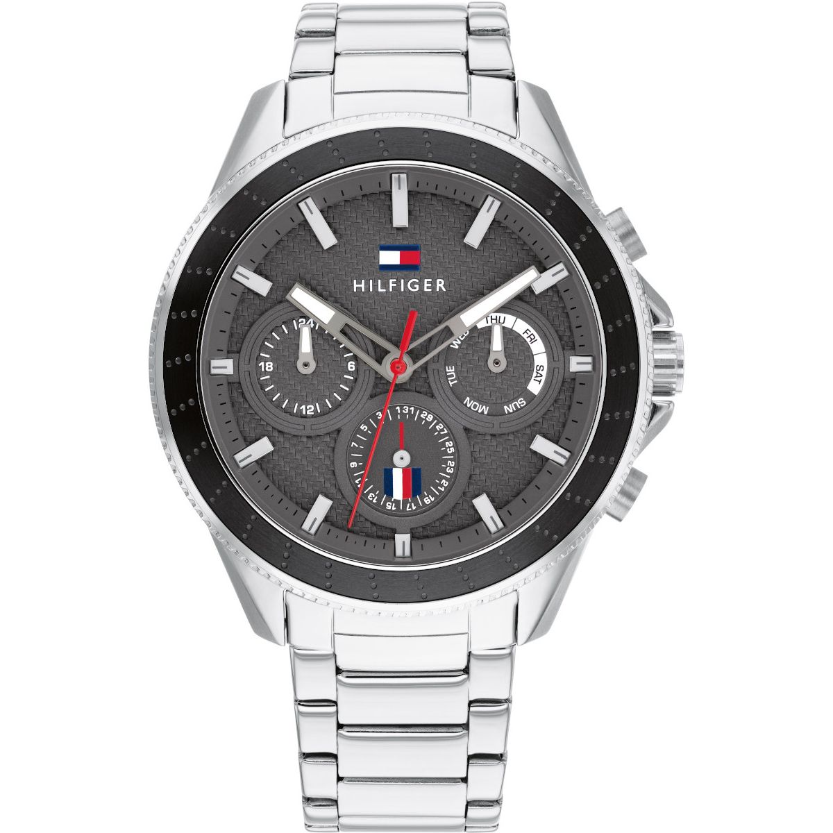 The Tommy Hilfiger Aiden 1791857 Gents Stainless Steel Watch features a stainless steel band, black dial with three subdials, and the iconic logo below 12 o’clock.