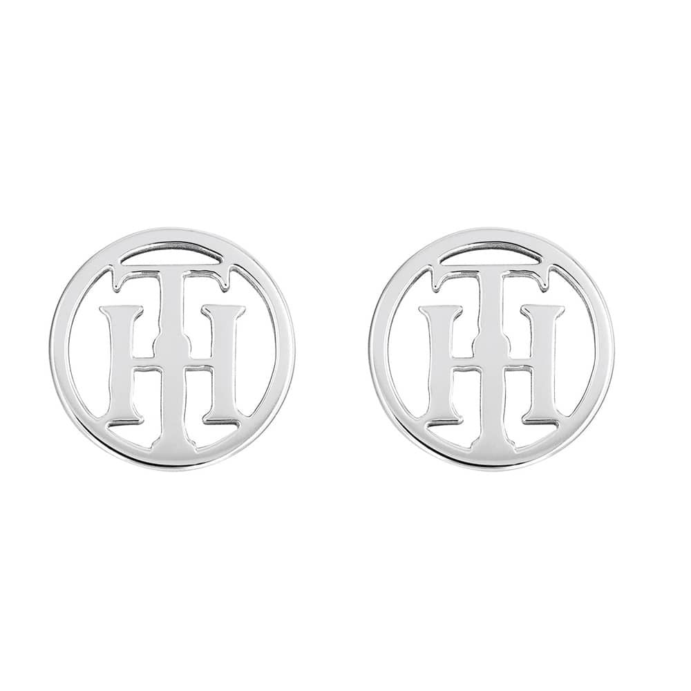 The Tommy Hilfiger Silver Tone Stainless Steel TH Logo Stud Earrings (2780286) feature overlapping "H" designs at the center, inspired by the iconic TH logo.