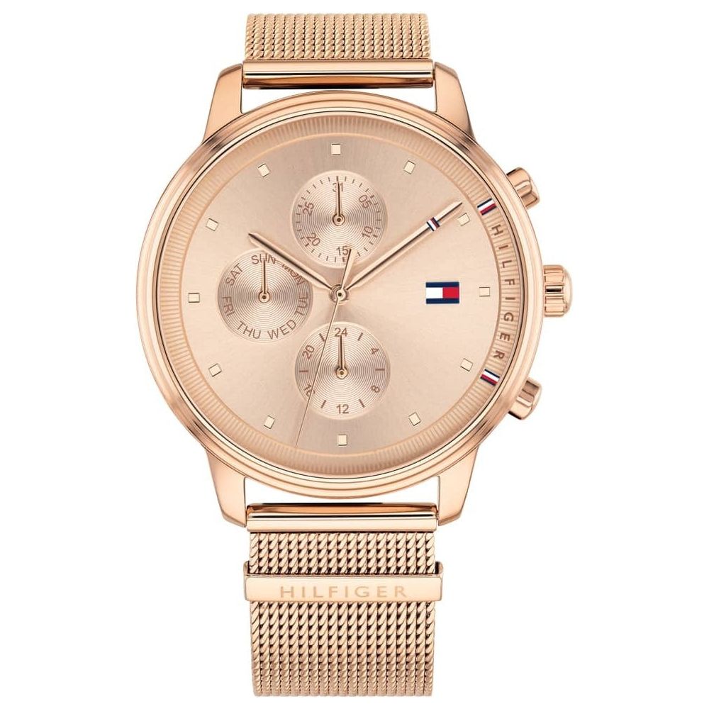 The Tommy Hilfiger Blake Rose Gold Plated Mesh Strap Watch 1781907 features a mesh band, three subdials, and the Tommy Hilfiger logo on the dial.