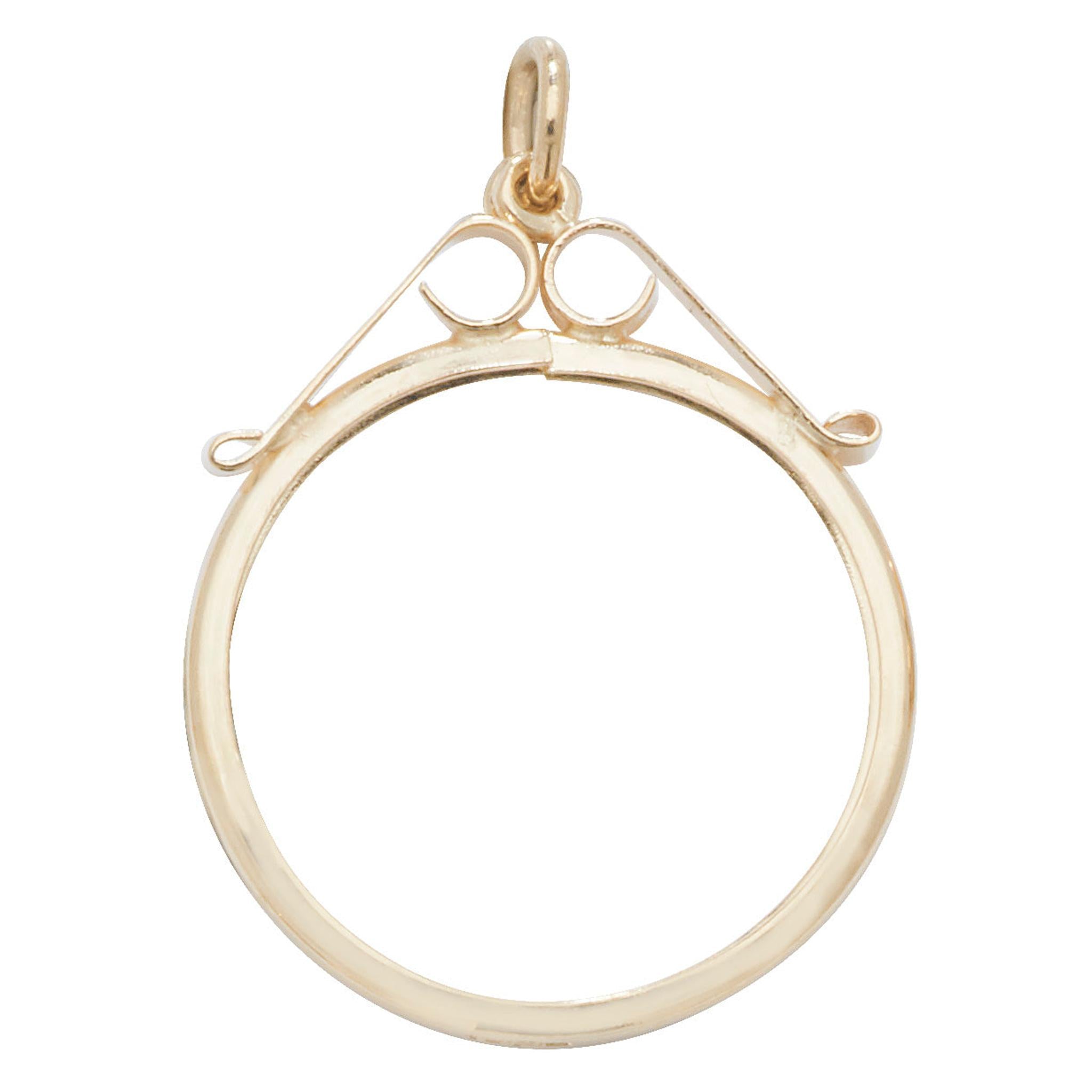 The W/G DIA MICRO PAVE OFFSET SET features a gold circular pendant frame with a top loop for chain attachment and decorative grain set wire accents near the top.